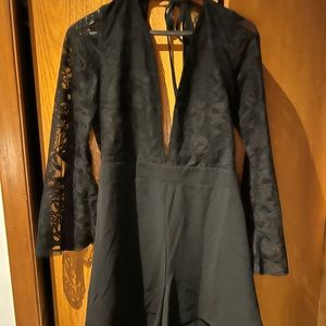 Black deep plunge romper. Lace sleeves size l- Charlotte Russe